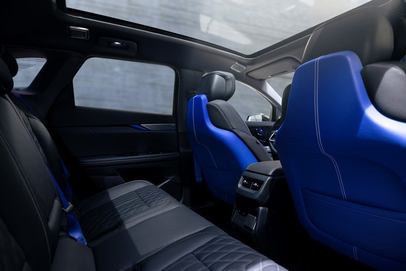 Back Seat View of the 2026 OPTIQ-V Blue Front Seats, Sun Roof, and Interior | D'ELLA Cadillac in QUEENSBURY NY